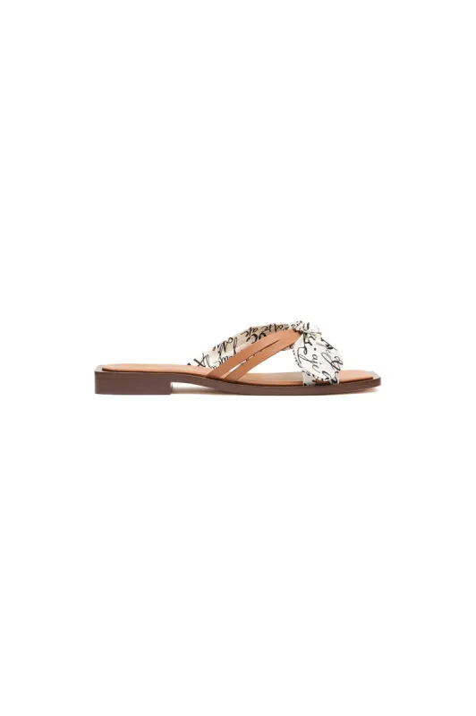Maren Logo Tie Slide sold by Aje