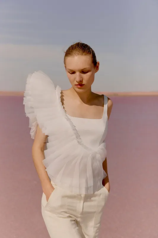 Orbit Sculptural Pleated Top sold by Aje