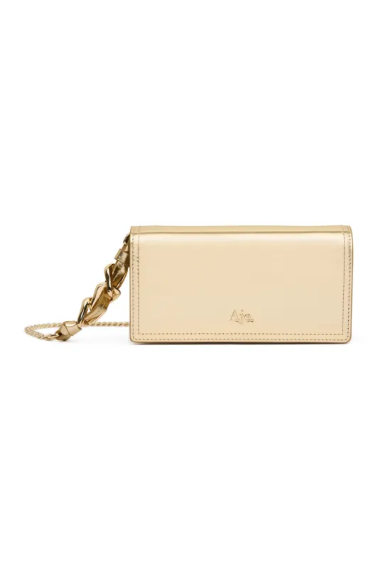 Rowen Chain Clutch sold by Aje