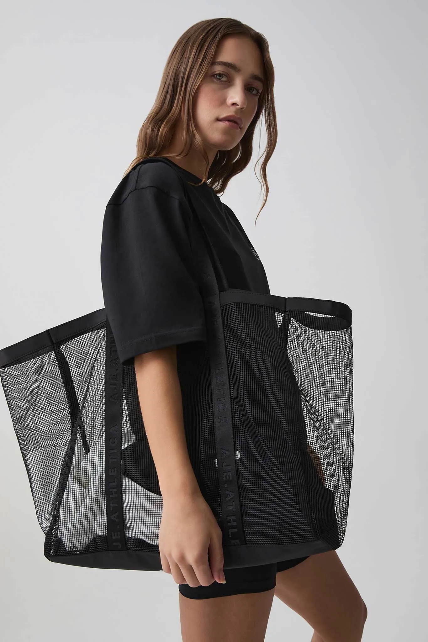 Logo Mesh Tote 988 sold by Aje