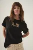 Devotion Braided Logo Tee sold by Aje