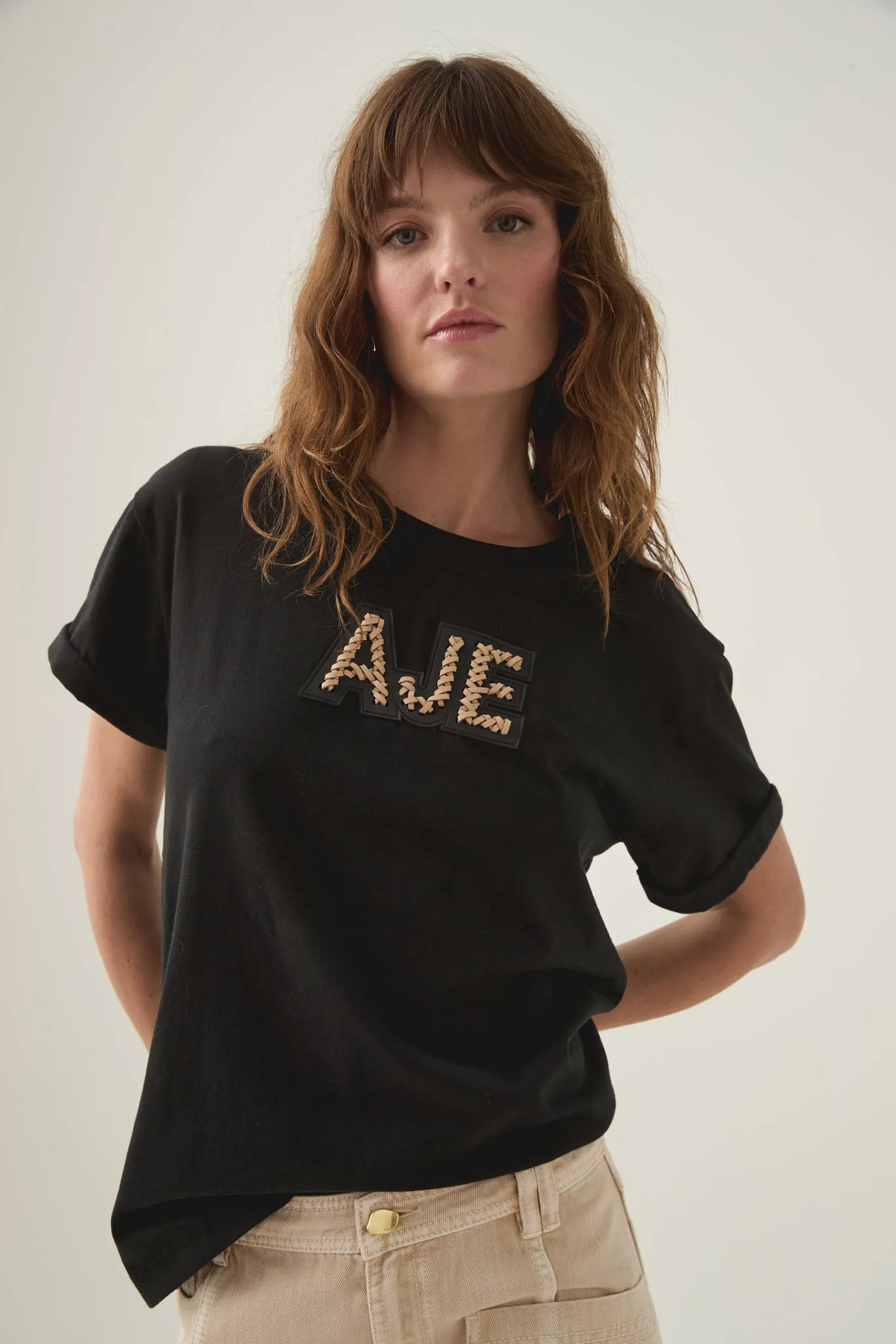 Devotion Braided Logo Tee sold by Aje