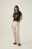 Bask Embellished Logo Tee sold by Aje