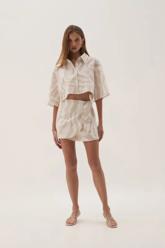 Eden Wrap Skirt sold by Aje