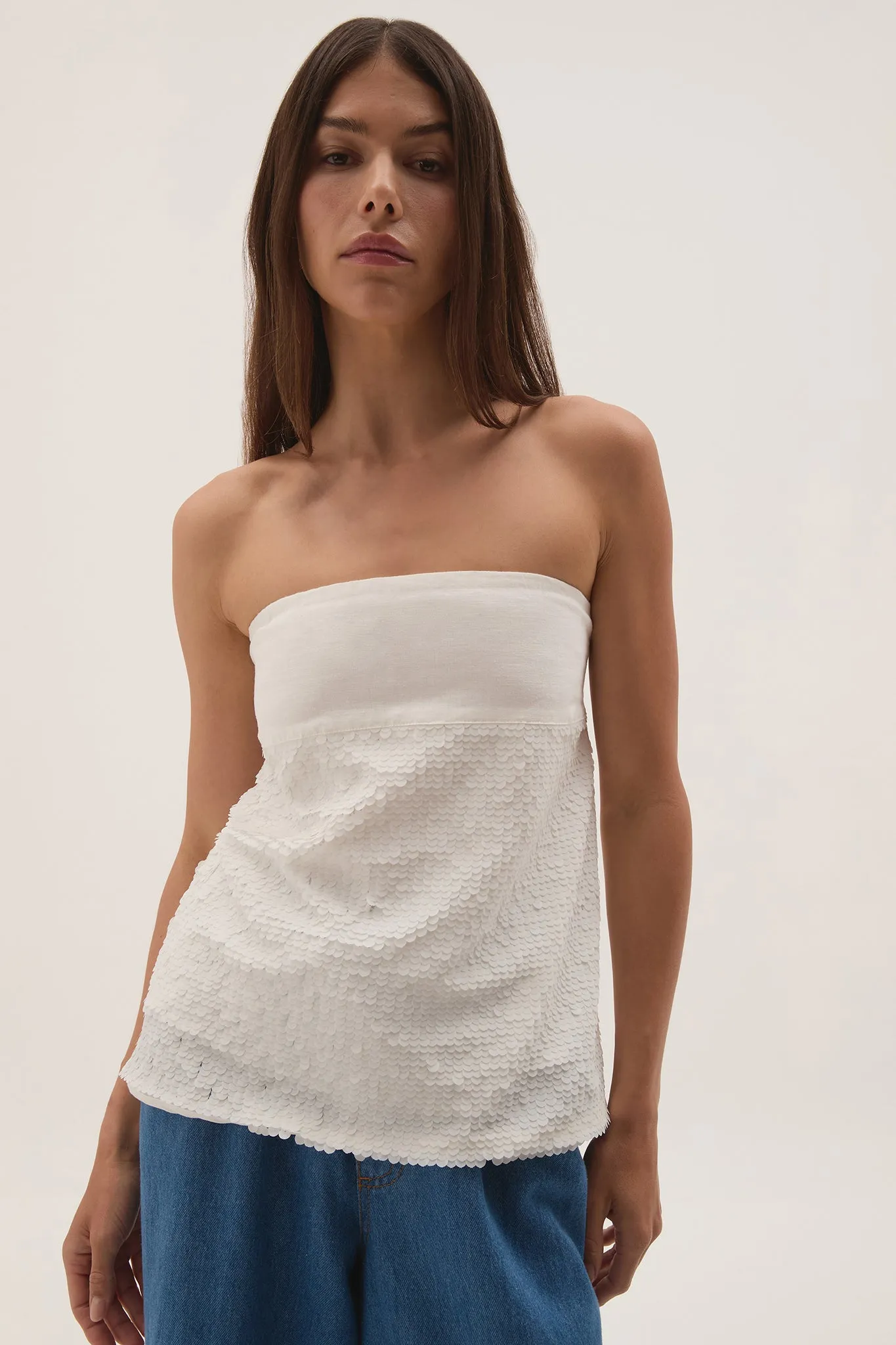 Nebula Strapless Top sold by Aje