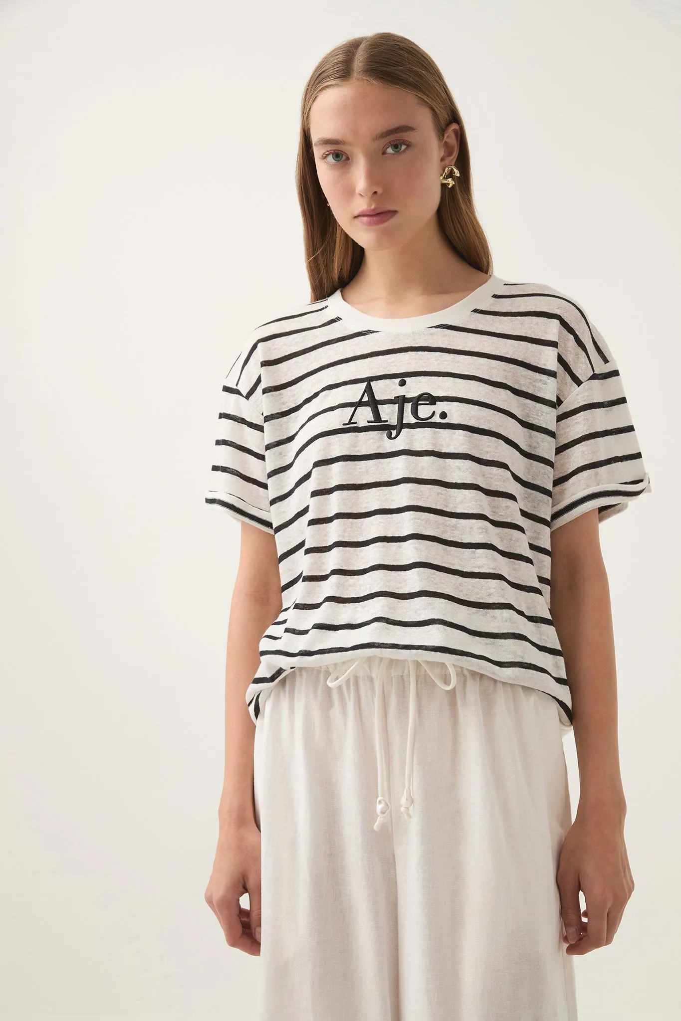 Perela Stripe Logo Tee sold by Aje