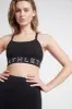 Logotape Adjustable Strap Sports Bra 307 sold by Aje