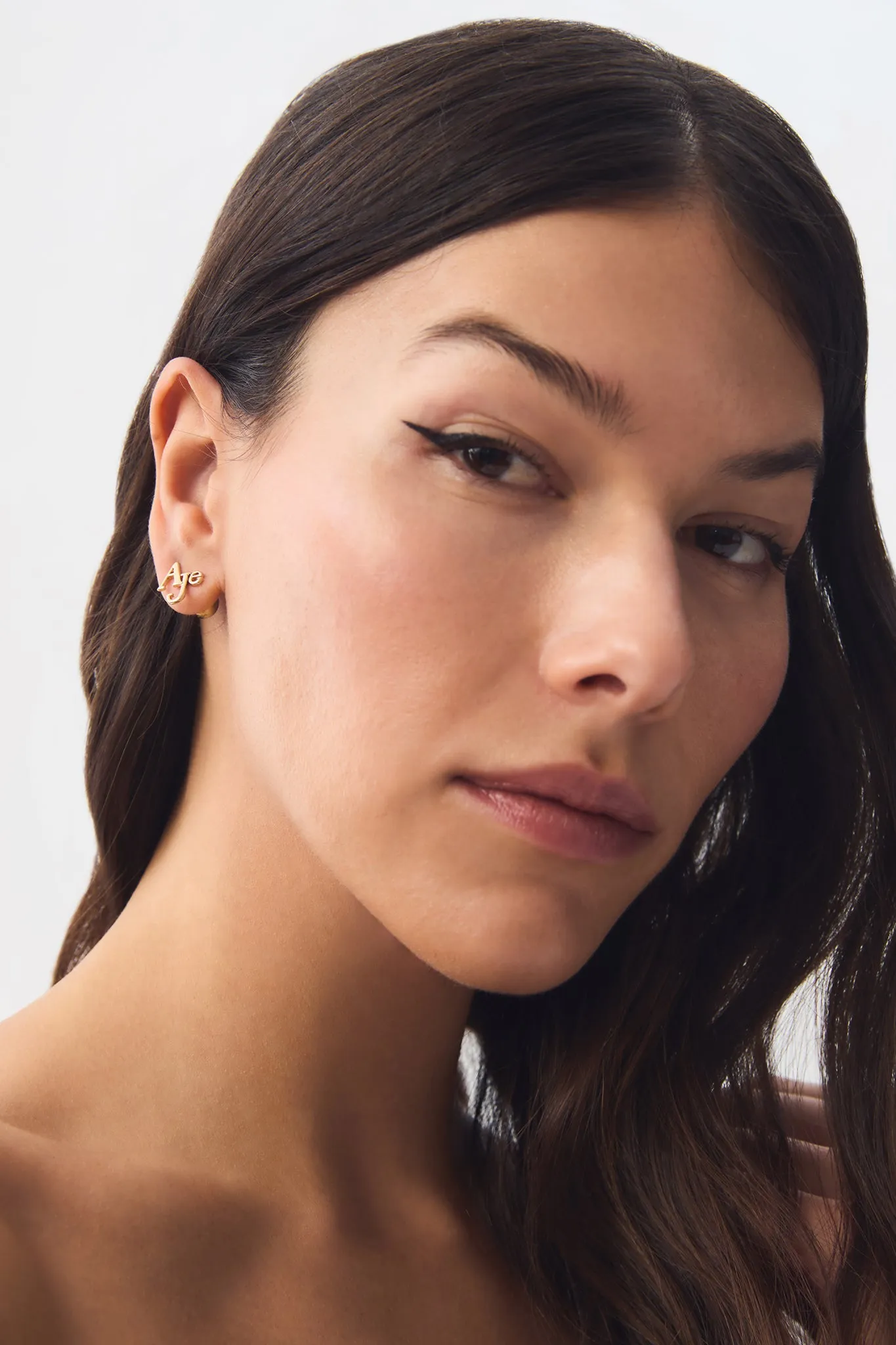 Revel Logo Stud sold by Aje