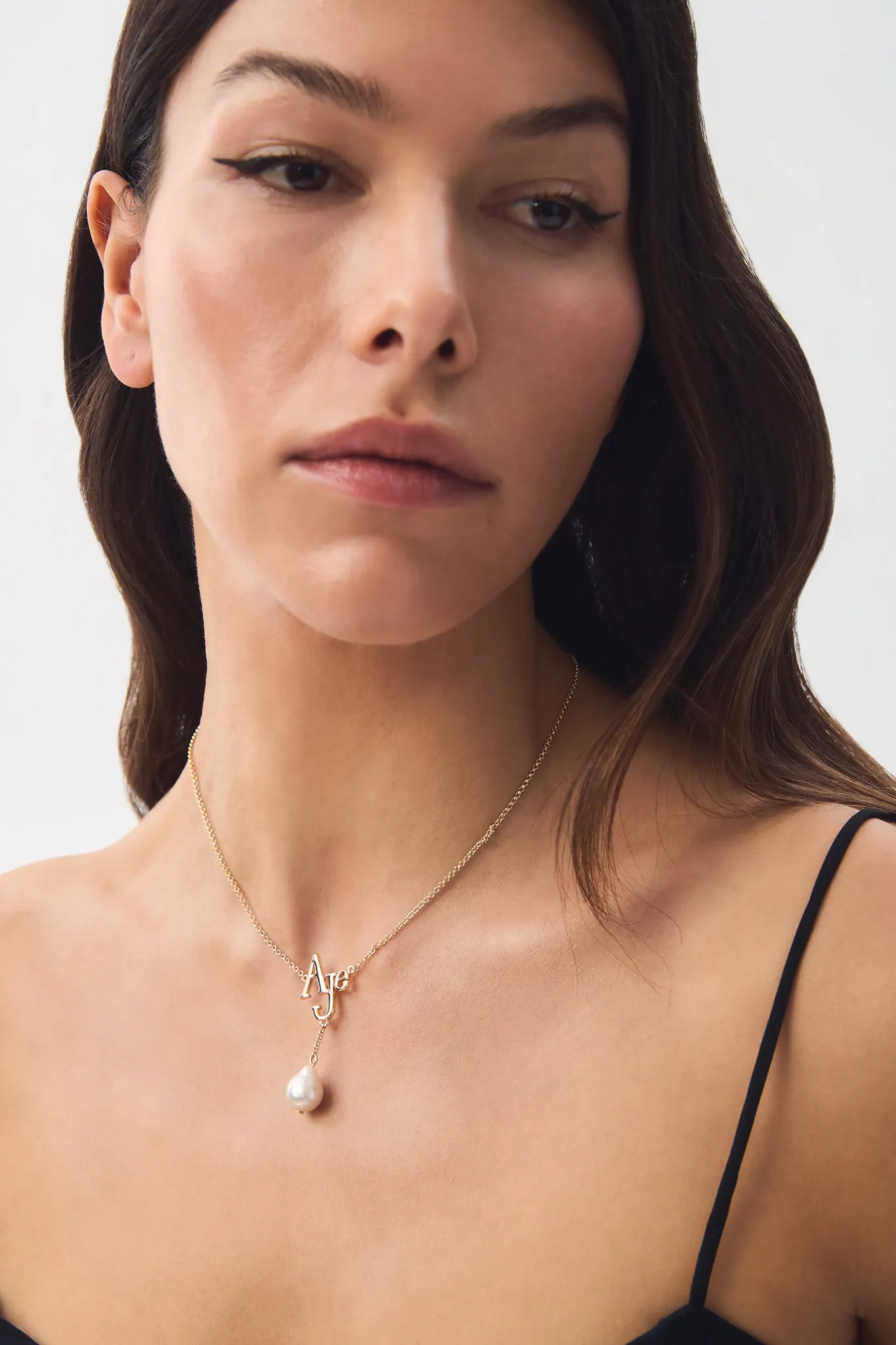 Revel Logo Necklace sold by Aje