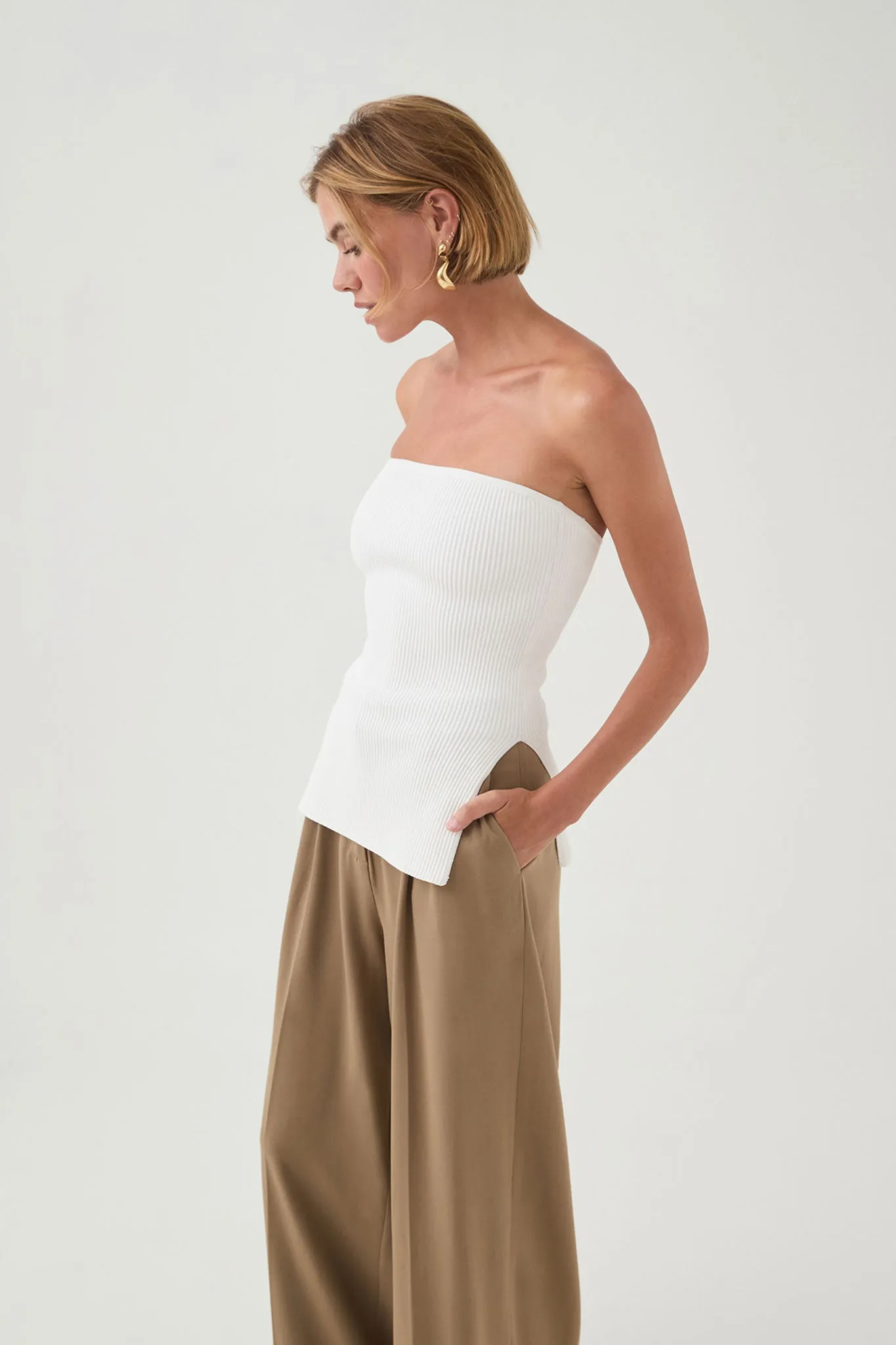 Deia Strapless Knit Top sold by Aje