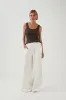 Cowrie Scoop Tank sold by Aje