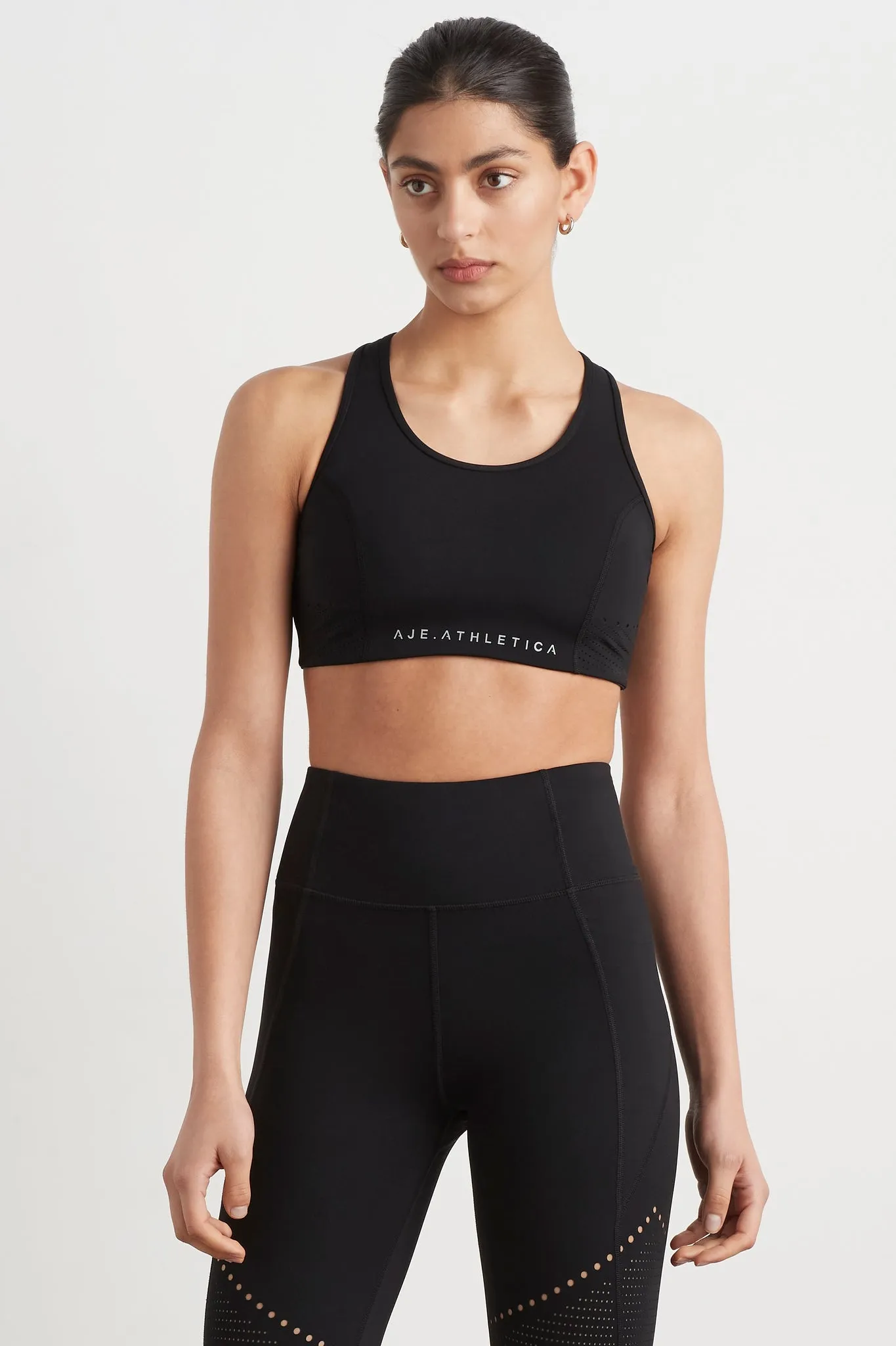Perforated Racer Sports Bra 339 sold by Aje
