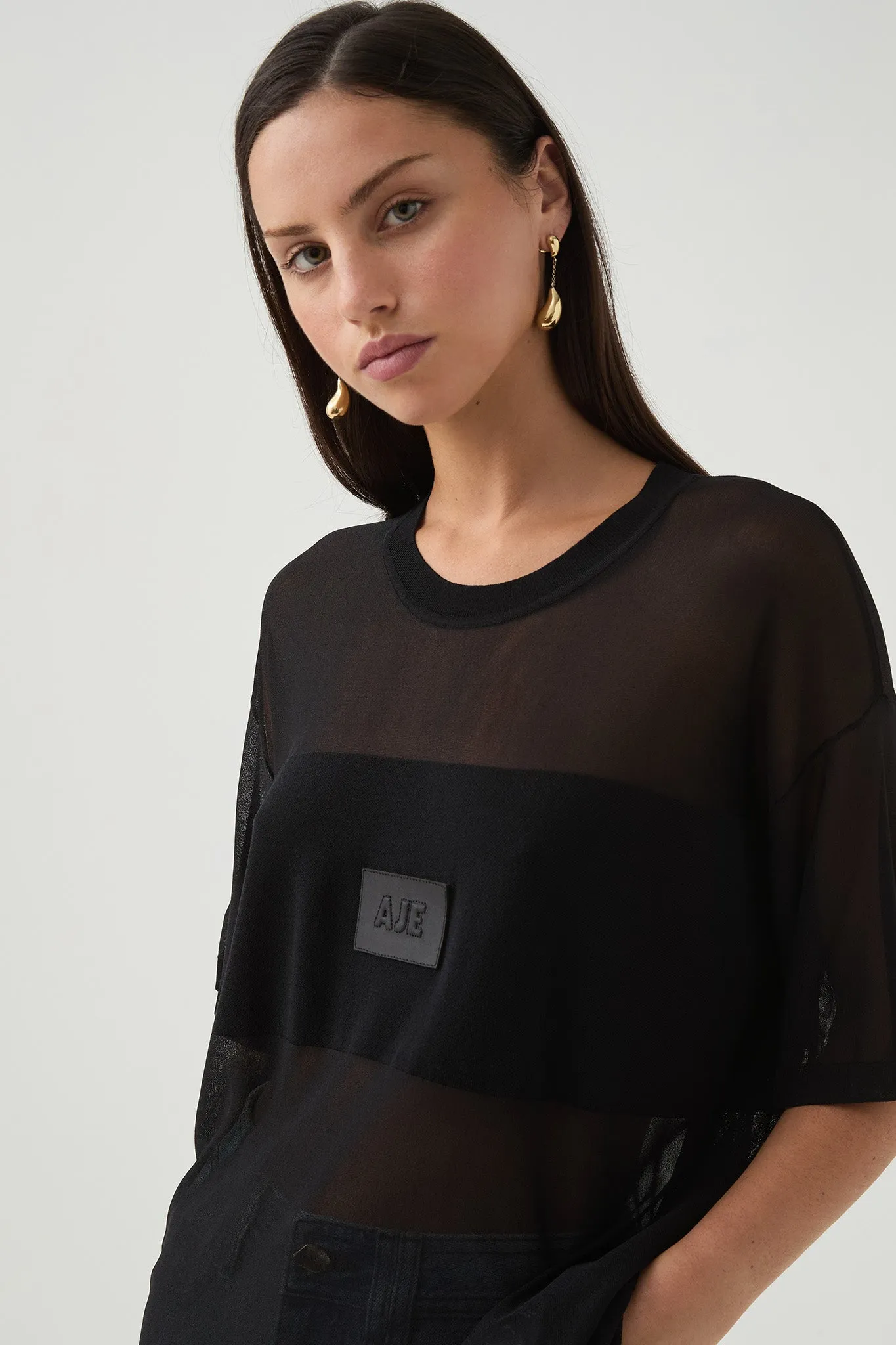 Noir Logo Knit Tee sold by Aje