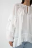 Mina Blouse sold by Aje