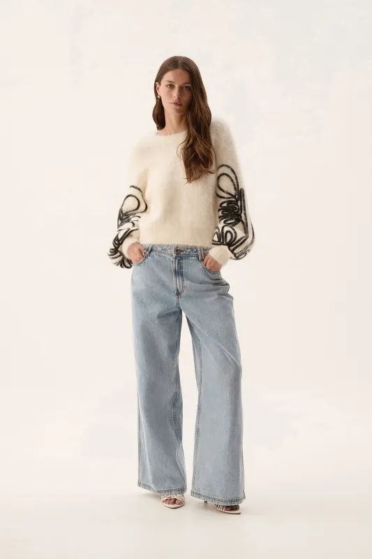 Freeflow Blouson Sleeve Knit sold by Aje