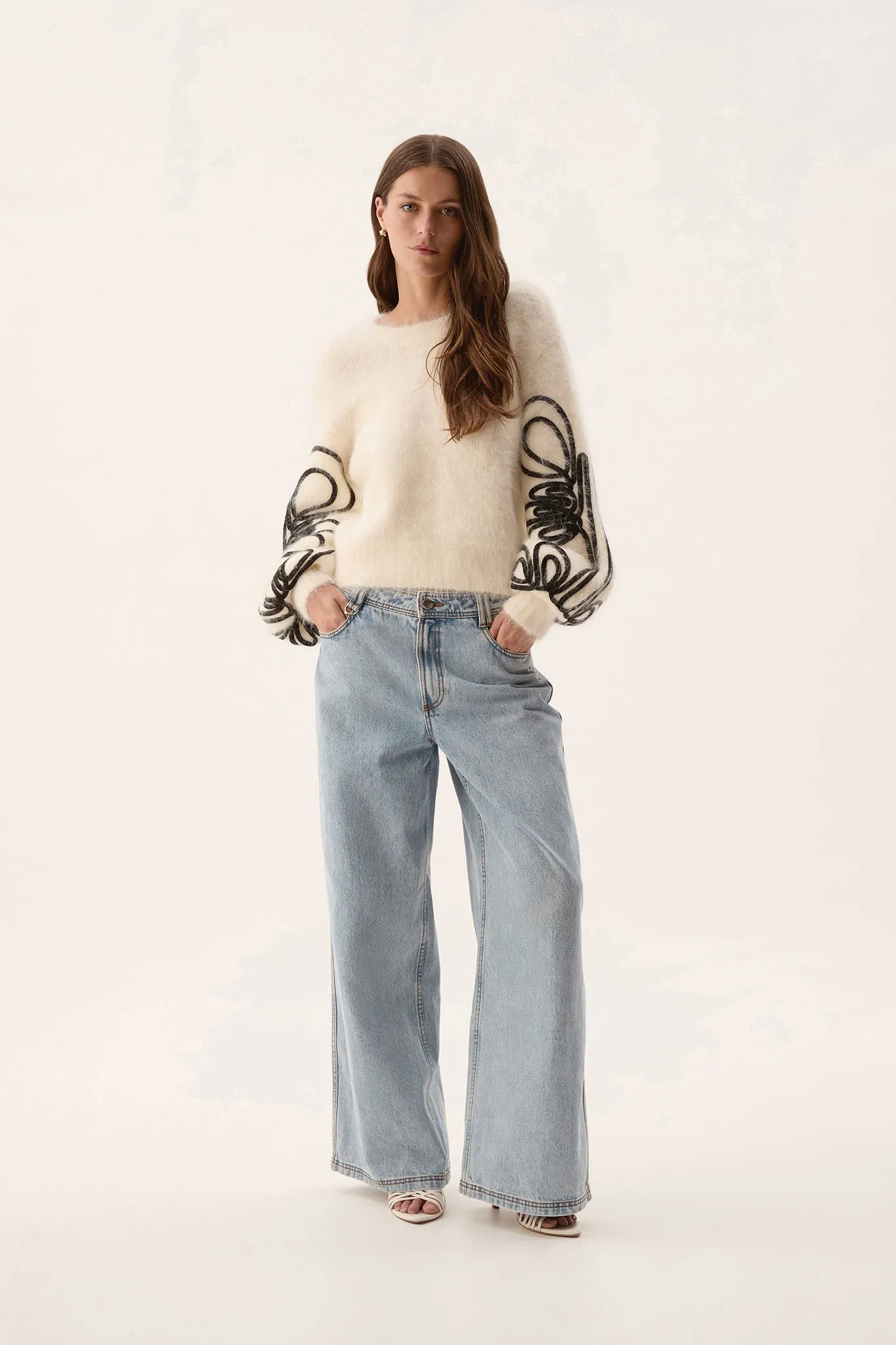 Freeflow Blouson Sleeve Knit sold by Aje