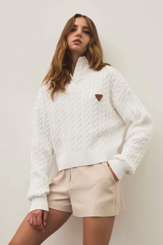 Naia Cropped Cable Knit sold by Aje