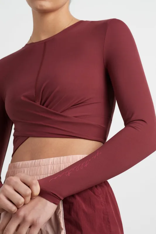 Twist Front Long Sleeve Crop Top 328 sold by Aje