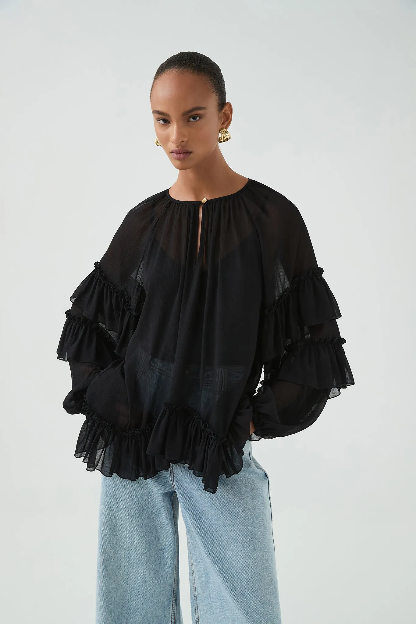 Mina Blouse sold by Aje