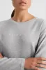 Keyhole Drawstring Long Sleeve Tee 149 sold by Aje