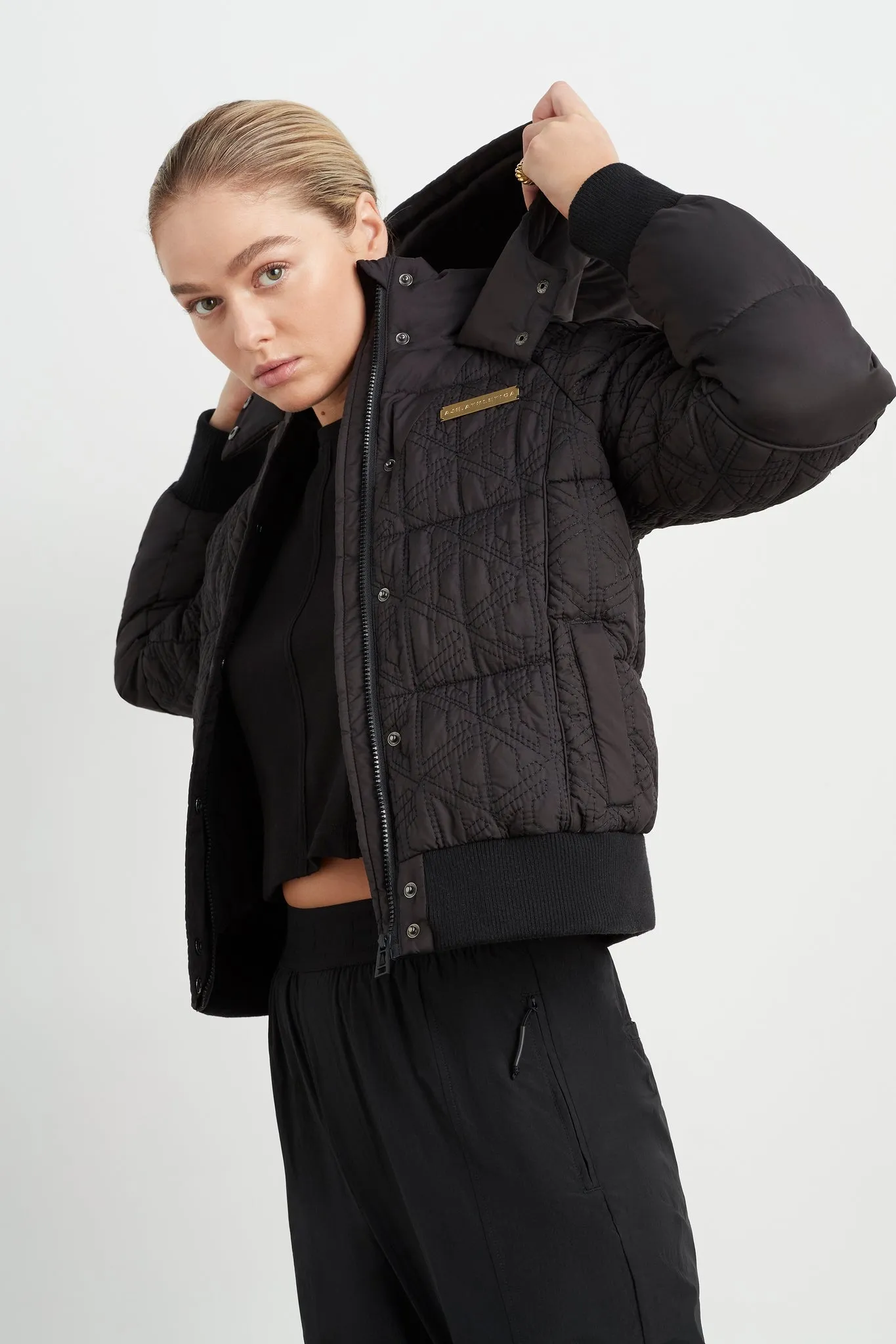 Quilted Geo Logo Puffer 724 sold by Aje