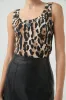 Cowrie Scoop Tank sold by Aje