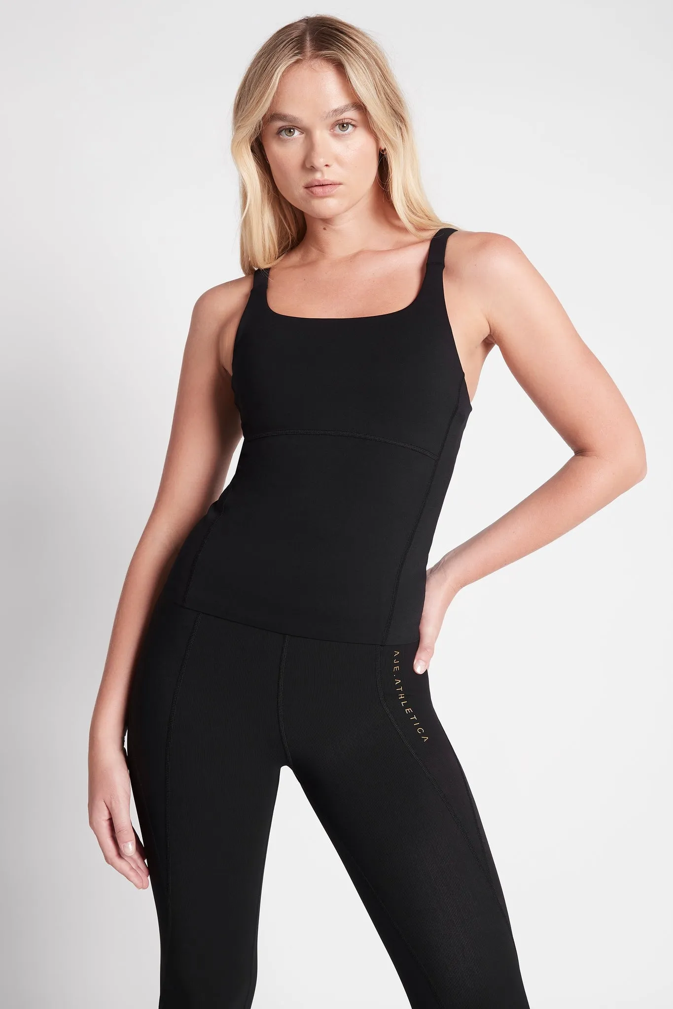 Cut Out Cross Back Embossed Tank Top 125 sold by Aje