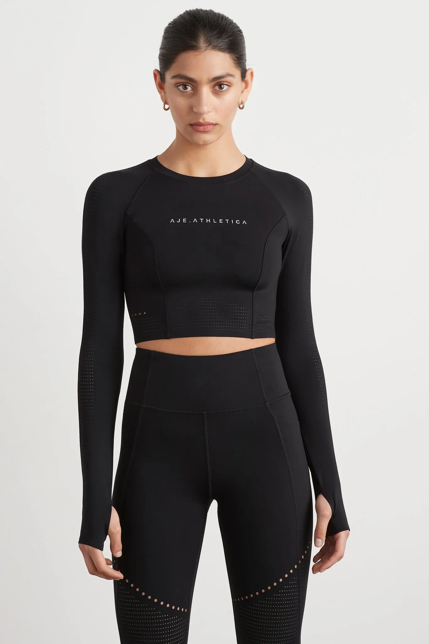 Perforated Long Sleeve Crop Top 340 sold by Aje