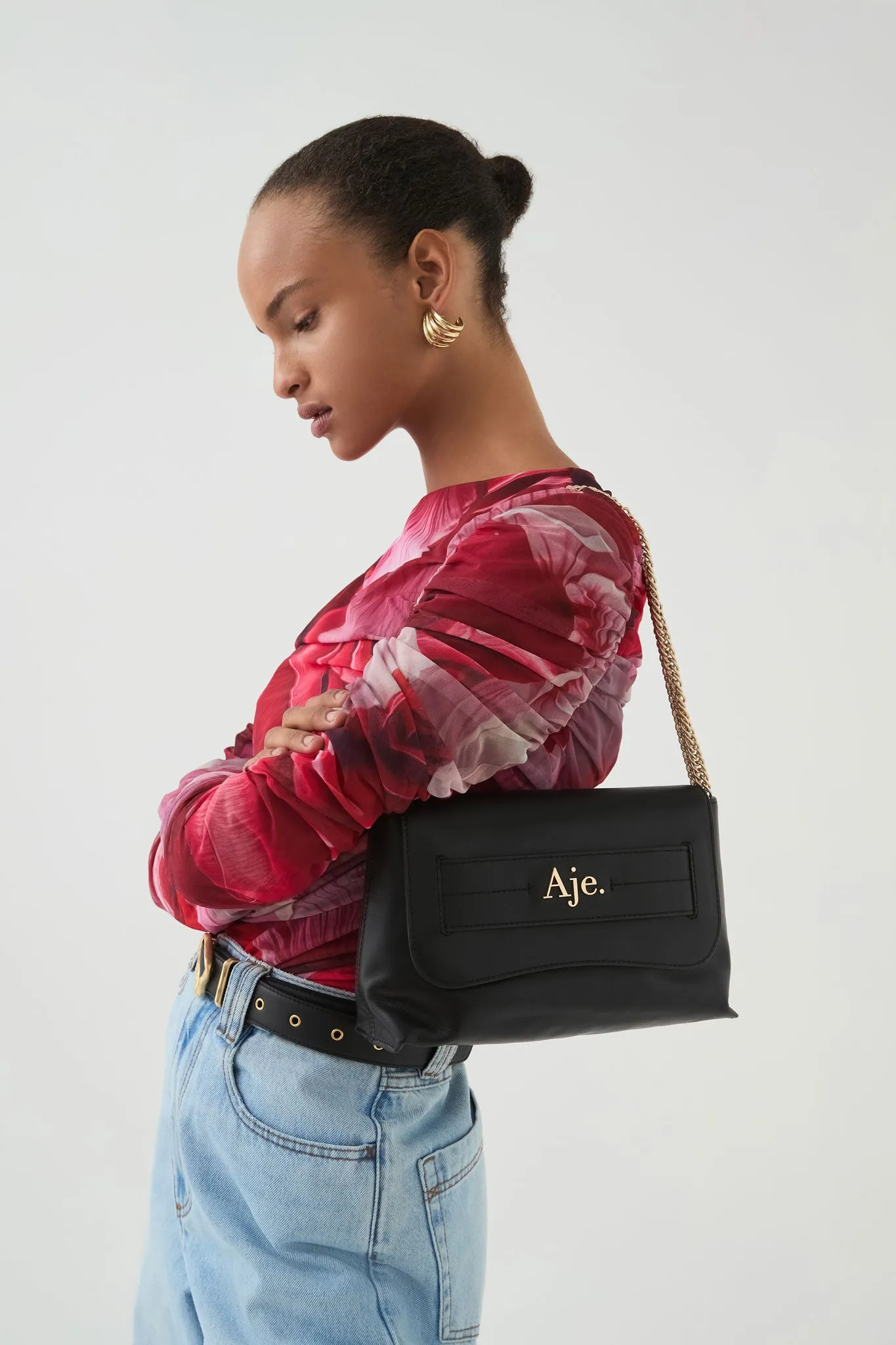 Renaissance Clutch sold by Aje