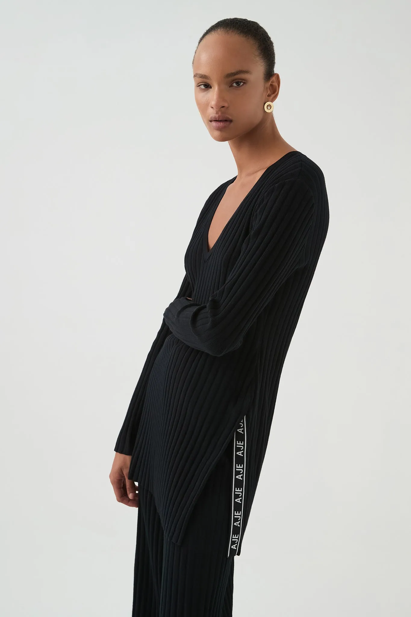 Archer Logo Trim Knit Tunic sold by Aje