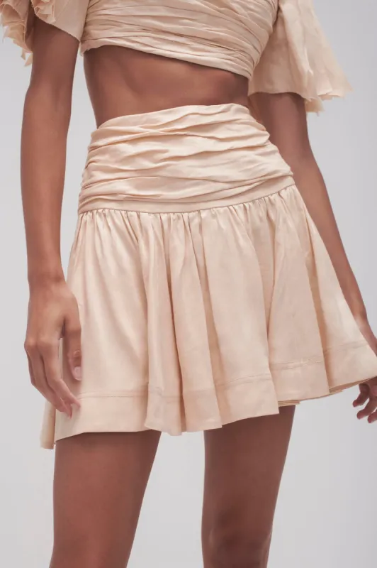 Cari Ruched Waist Mini Skirt sold by Aje