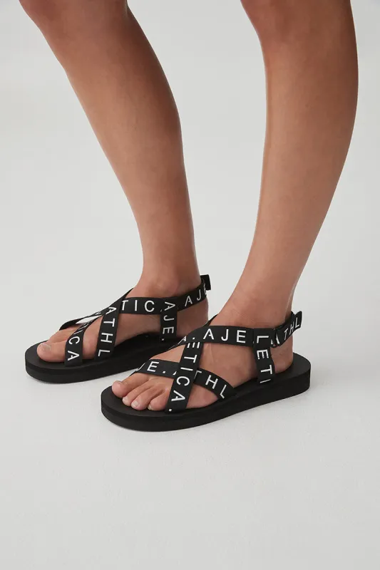 Logotape Strap Sandal 912 sold by Aje