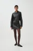 Raven Mini Skirt sold by Aje