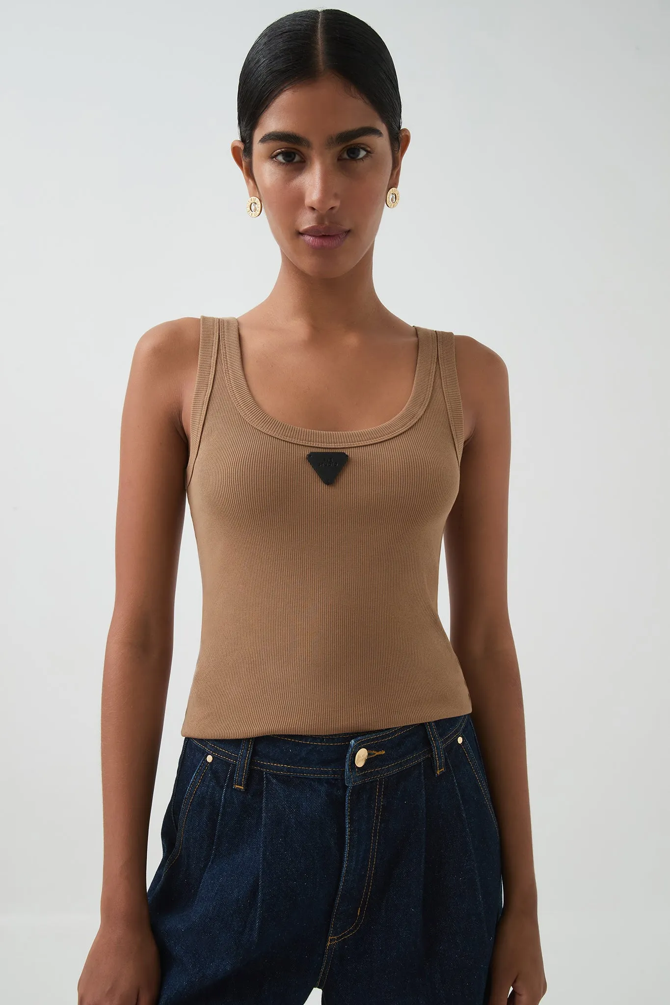 Cowrie Scoop Tank sold by Aje