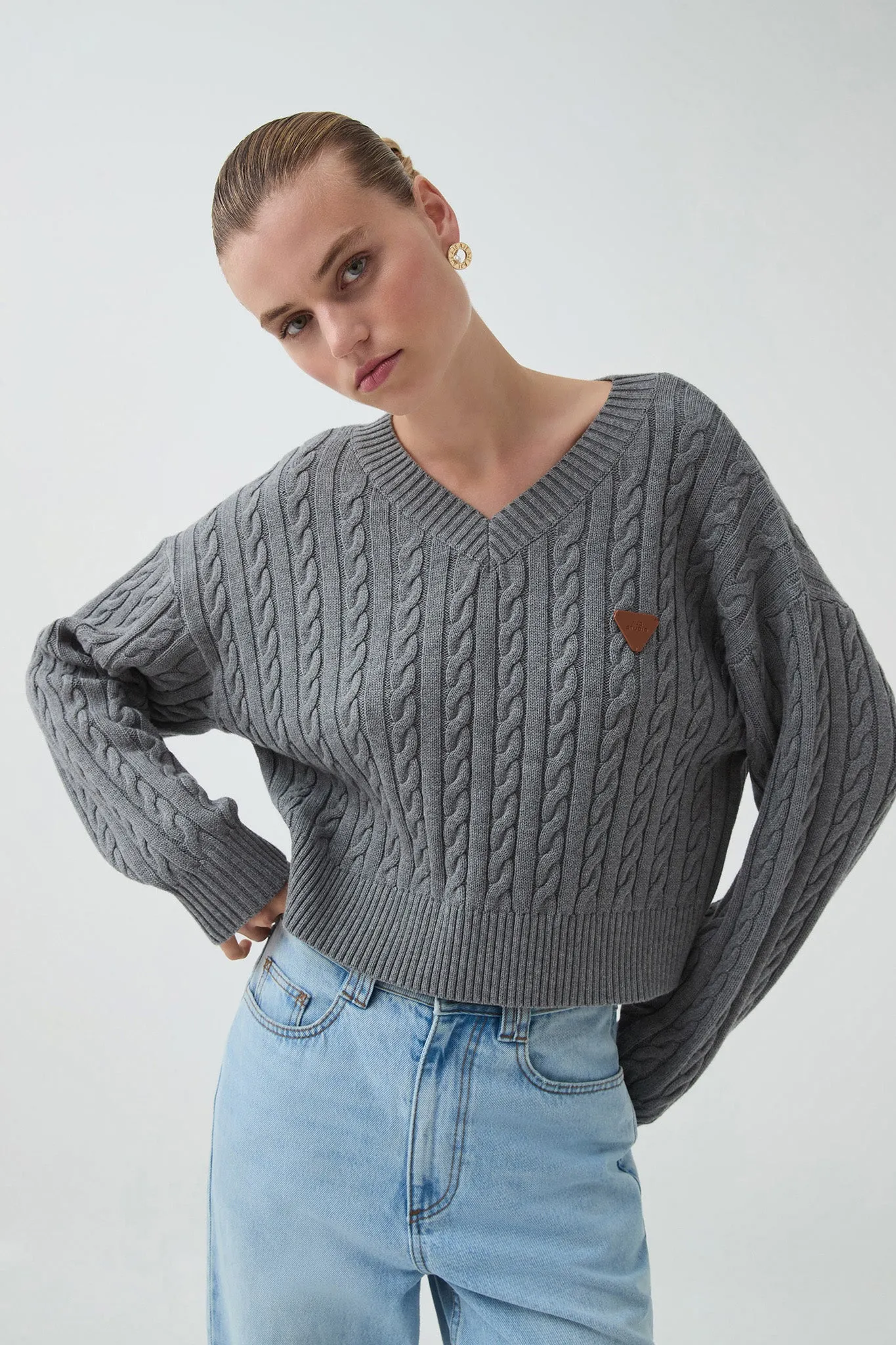 Naia Cropped Cable Knit sold by Aje