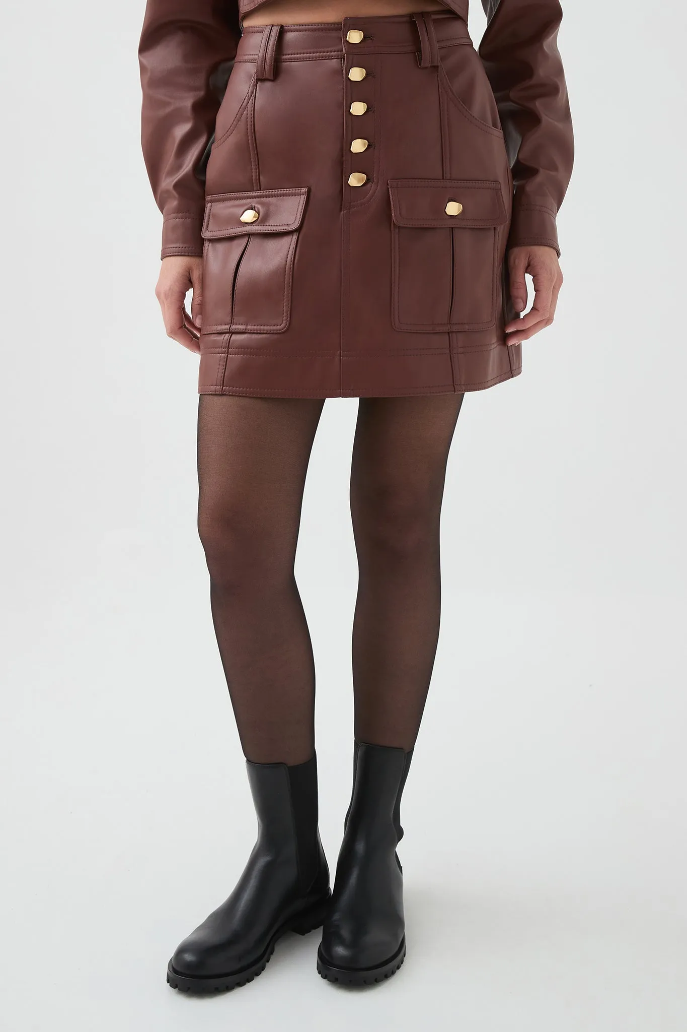 Sarina Mini Skirt sold by Aje