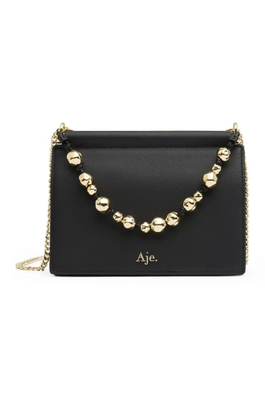 Cece Clutch sold by Aje