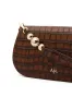 Saturn Clutch sold by Aje