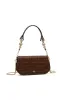 Saturn Clutch sold by Aje