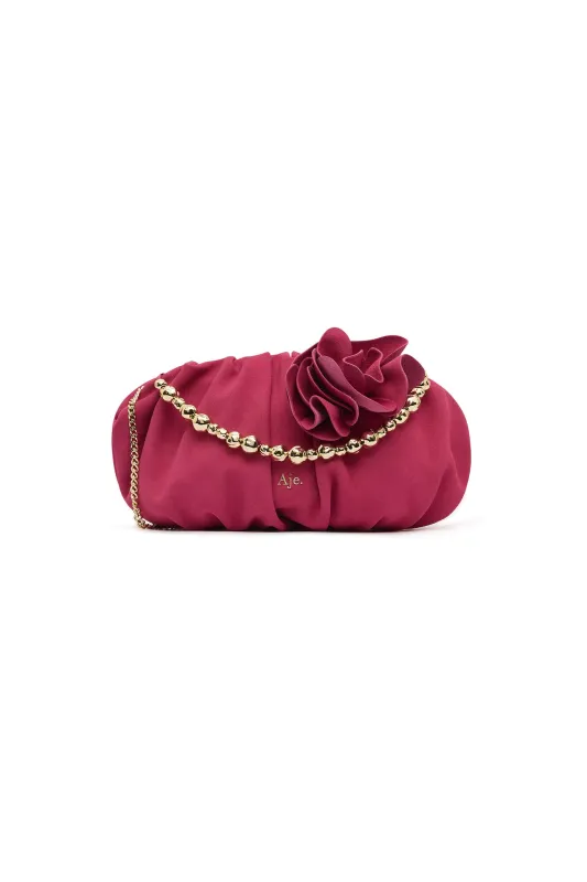Ari Flower Clutch sold by Aje