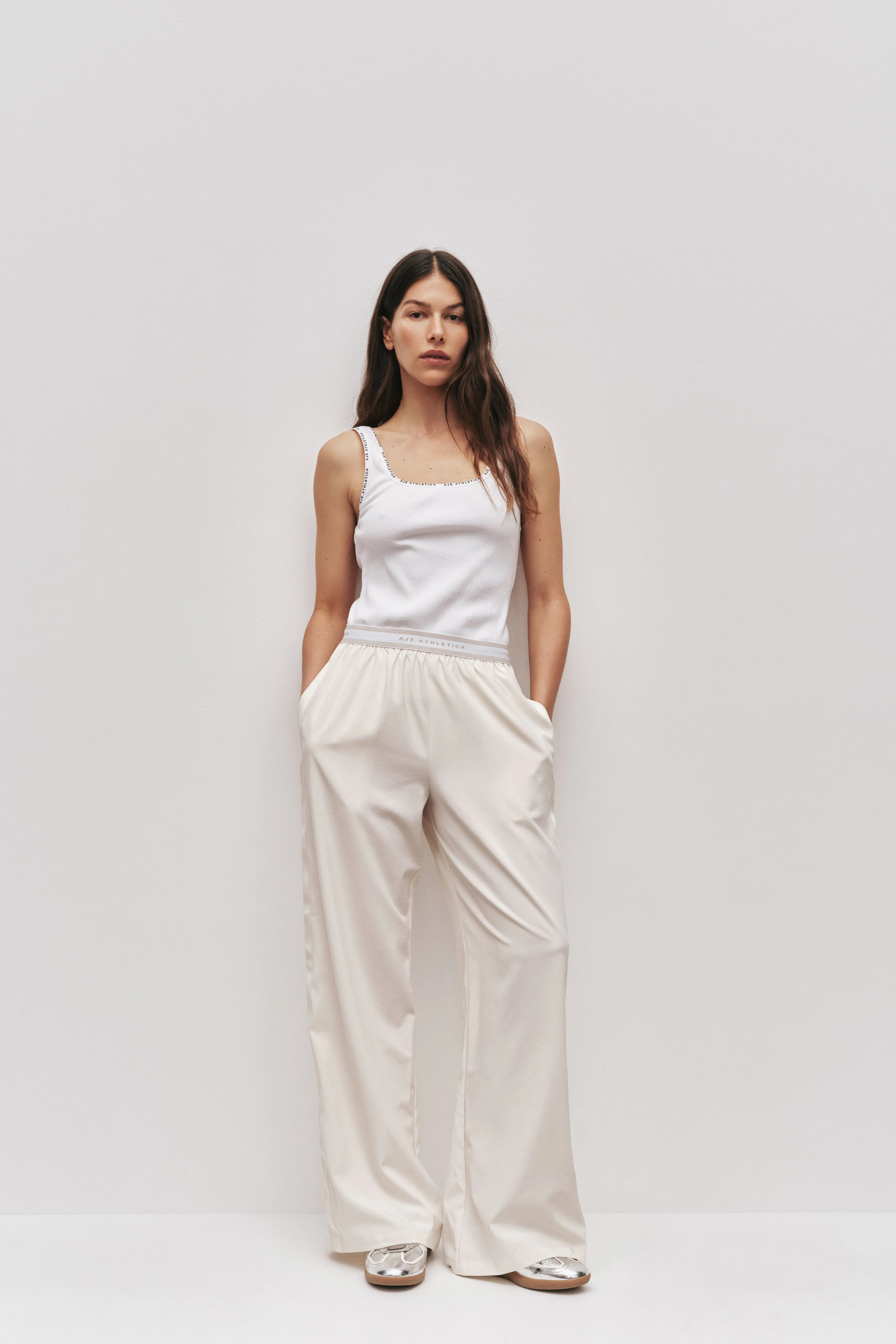 Logo Elastic Pant 513 sold by Aje