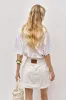 Ivy Denim Mini Skirt sold by Aje