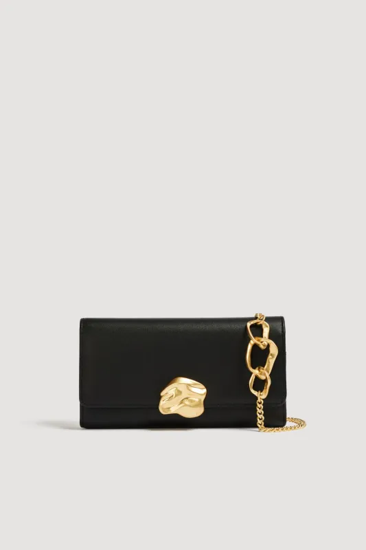 Isla Clutch sold by Aje
