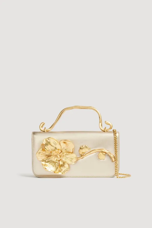 Celeste Flower Clutch sold by Aje