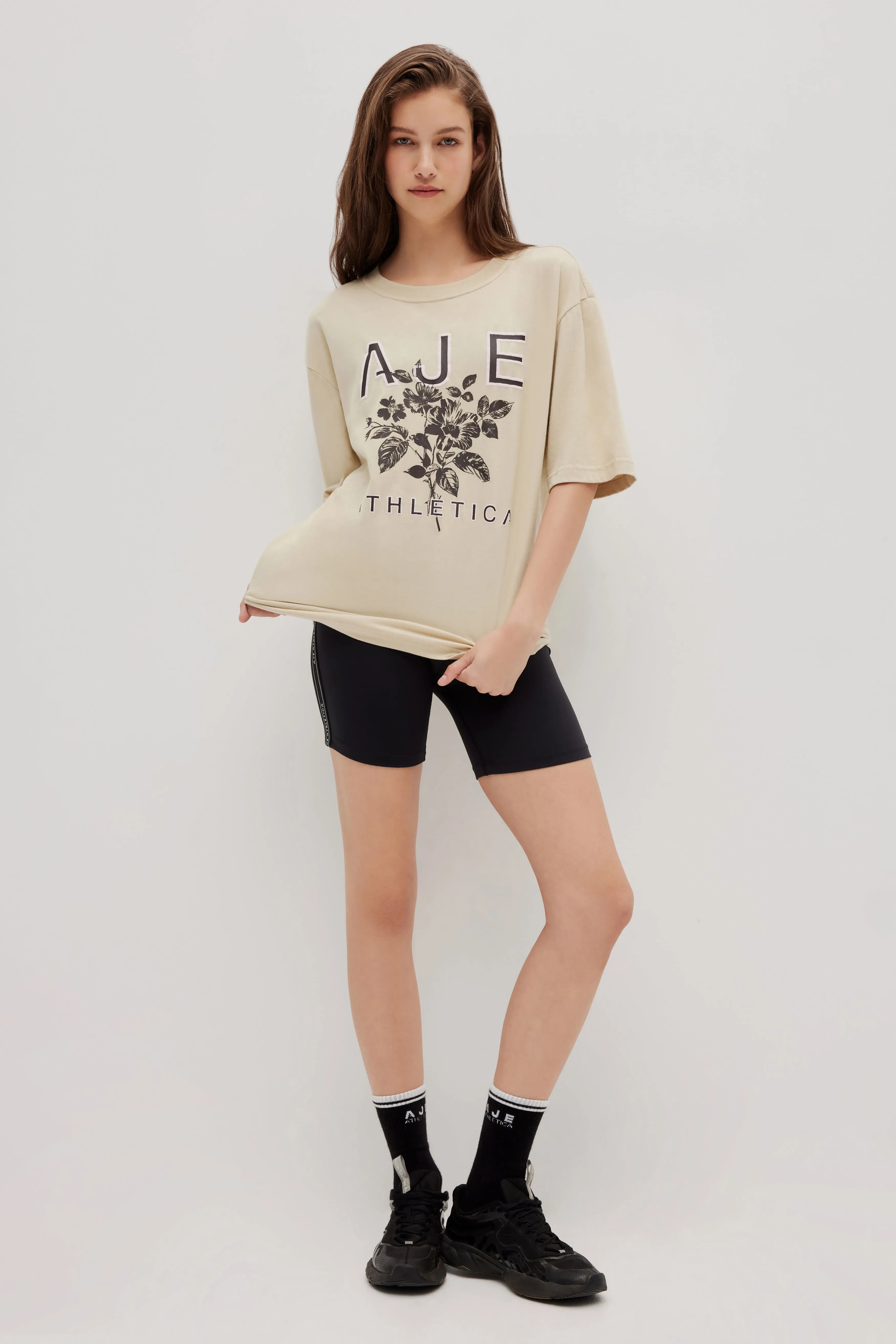 Flora Logo Tee 102 sold by Aje