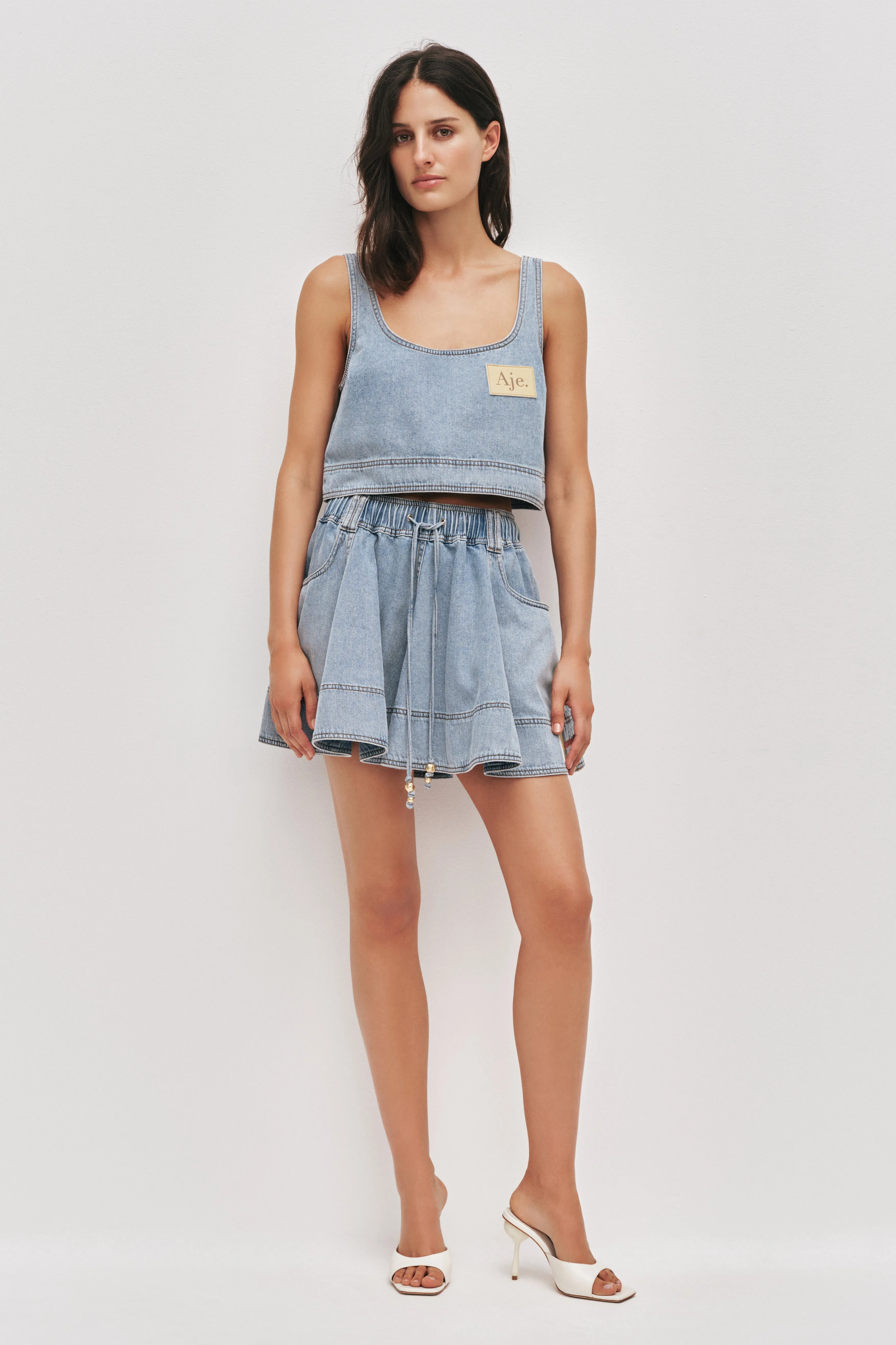 Lumi Denim Top sold by Aje