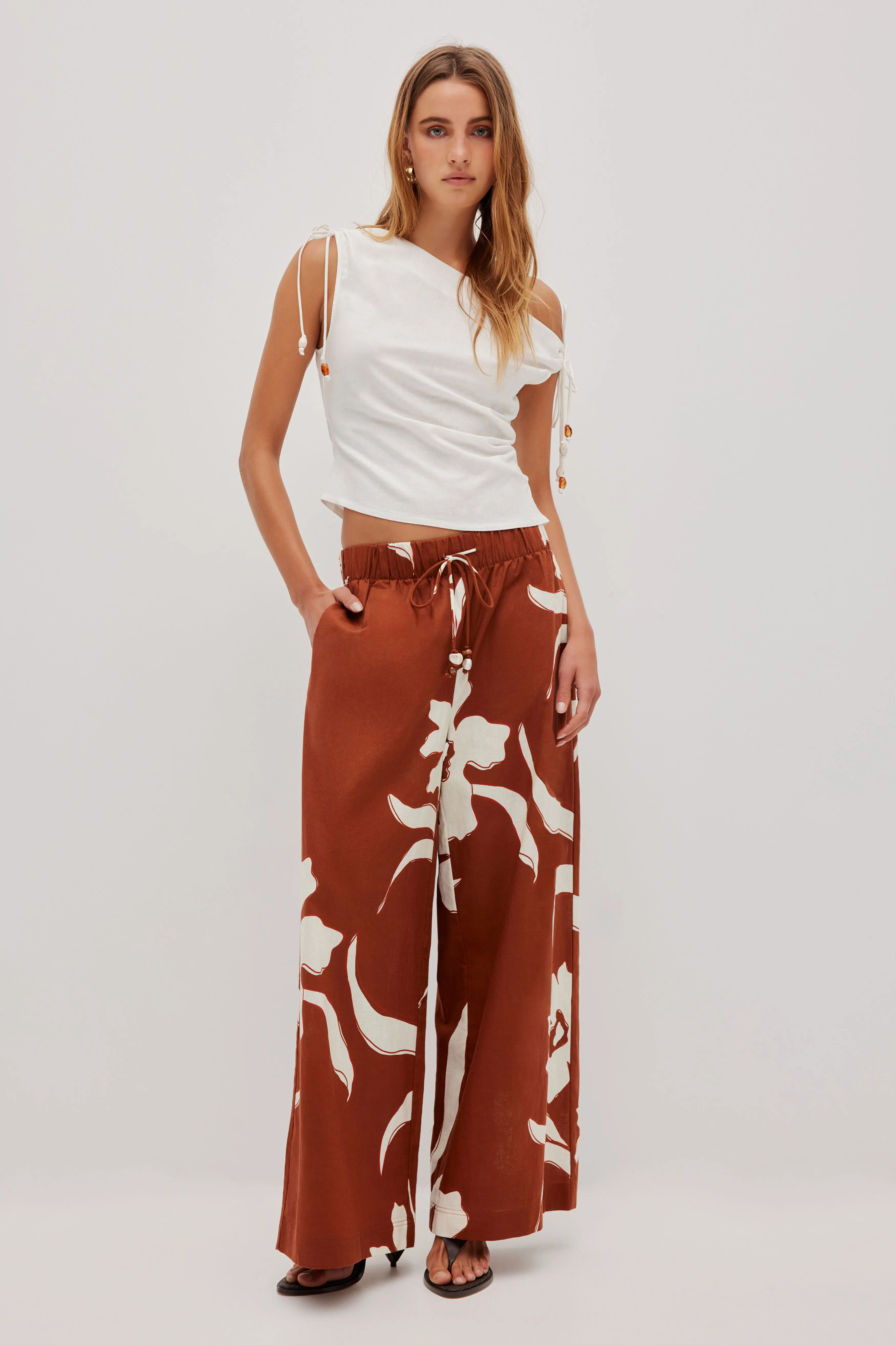 Laure Asymmetrical Top sold by Aje