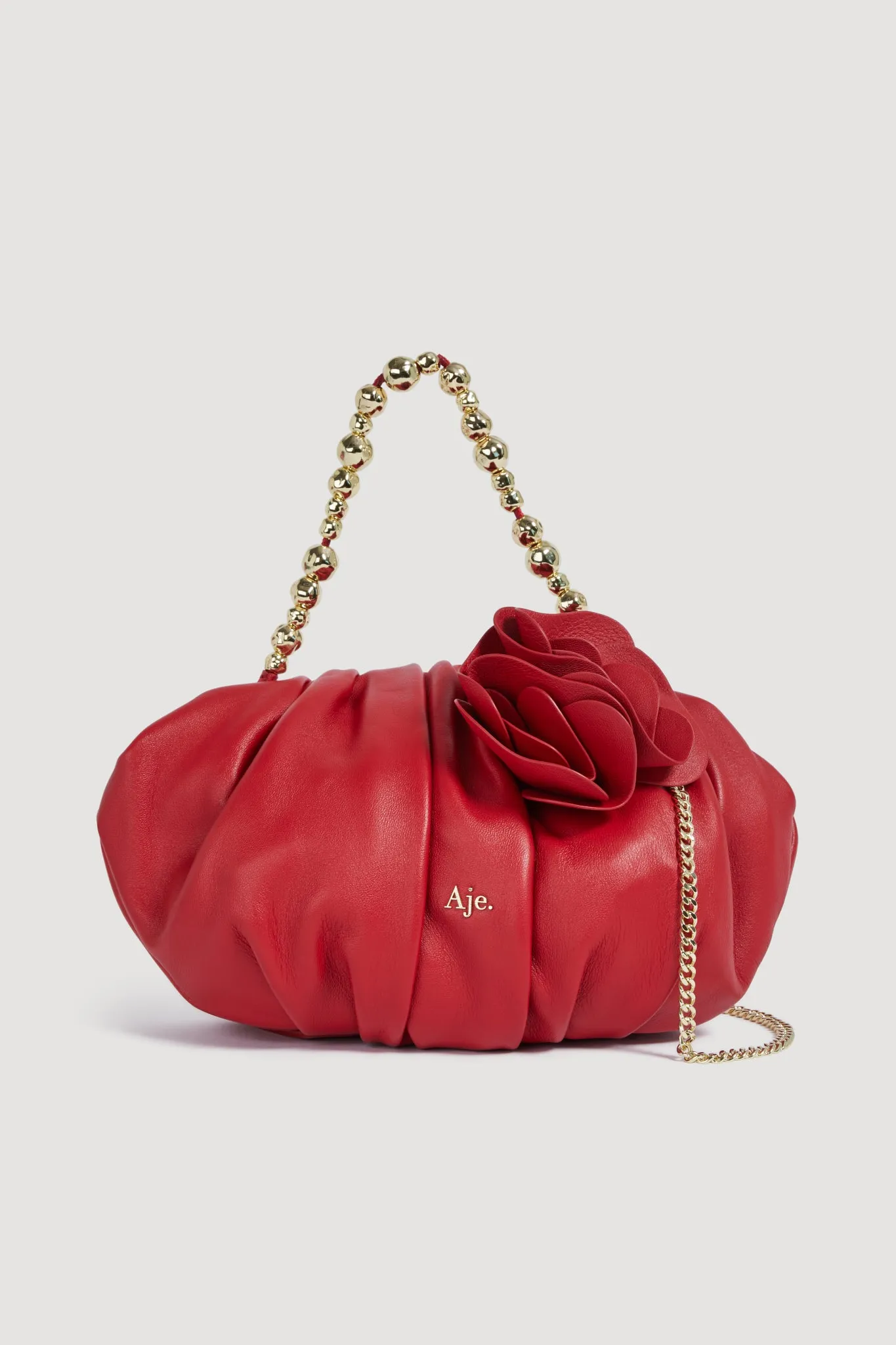 Ari Flower Clutch sold by Aje