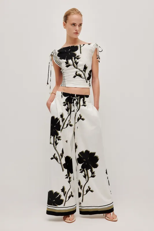 Laure Asymmetrical Top sold by Aje