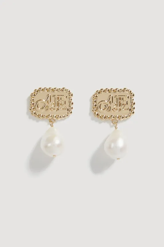 Aestra Pearl Drop Logo Earring sold by Aje